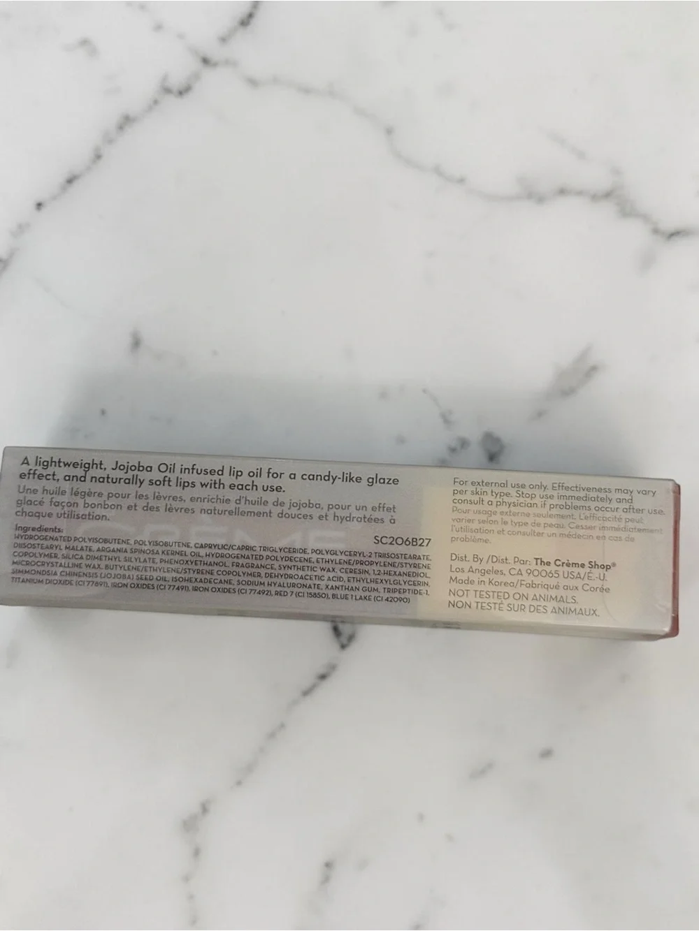 The Crème Shop Tinted Jelly Lip Oil Elixir - Yellow Pink